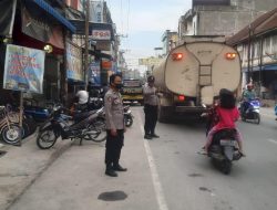 Polsek Perdagangan Amankan Pasar Tumpah Jelang Berbuka Puasa, Pastikan Situasi Aman dan Kondusif