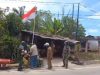 Keliling Desa di Lokasi TMMD, Babinsa Minta Warga Kibarkan Merah Putih