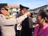 Kapolrestabes Medan Pimpin Upacara Kenaikan Pangkat dan Wisuda Purna Bakti Personel