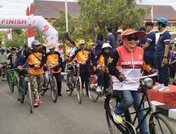 Ribuan Masyarakat dan Ratusan Hadiah Semarakkan Jalan Sehat dan Sepeda Santai Hari Bhayangkara ke – 79 di Polda Kalteng